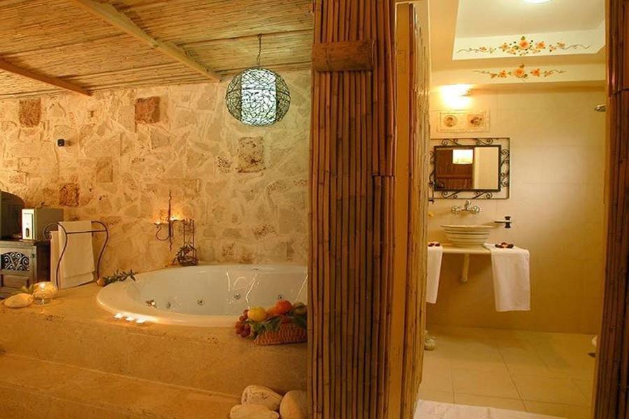 Hotel ביקתפוז וקלמנטינה- מתחם בקתות וסוויטות עם ג'קוזי פרטי ובריכה משותפת Liman Zimmer foto